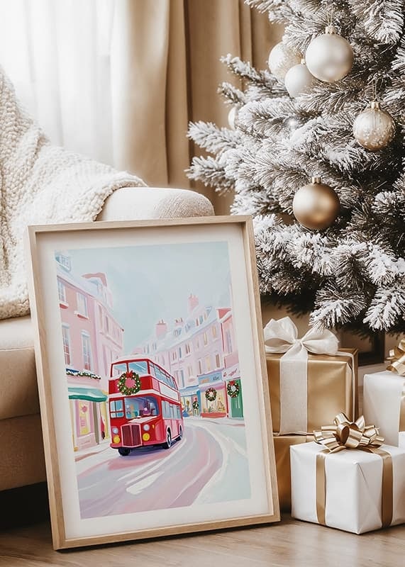 A poster of a red double-decker bus driving through a snowy, Christmas-decorated city-12