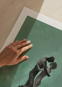 A poster of two figures in a tender embrace-9