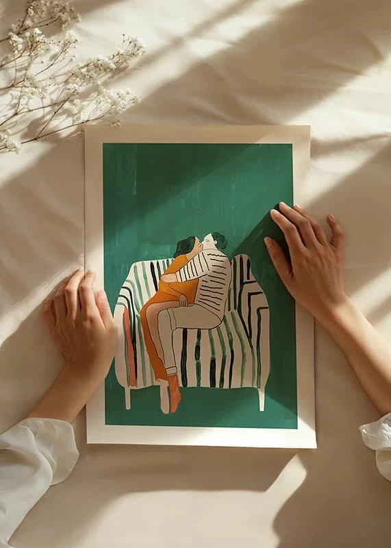 A poster of a couple in a loving embrace on a striped sofa-12