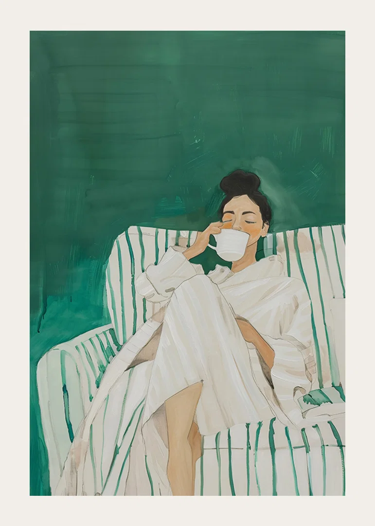 A poster showing a woman in a bathrobe, relaxed on a sofa enjoying a cup-12