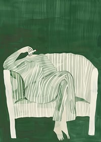A poster of a person in striped clothes matching the sofa-7