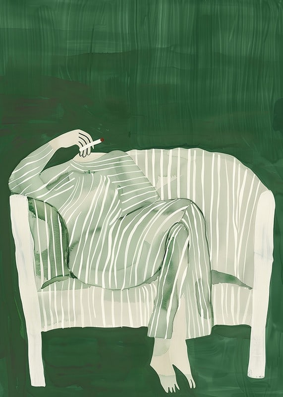 A poster of a person in striped clothes matching the sofa-12
