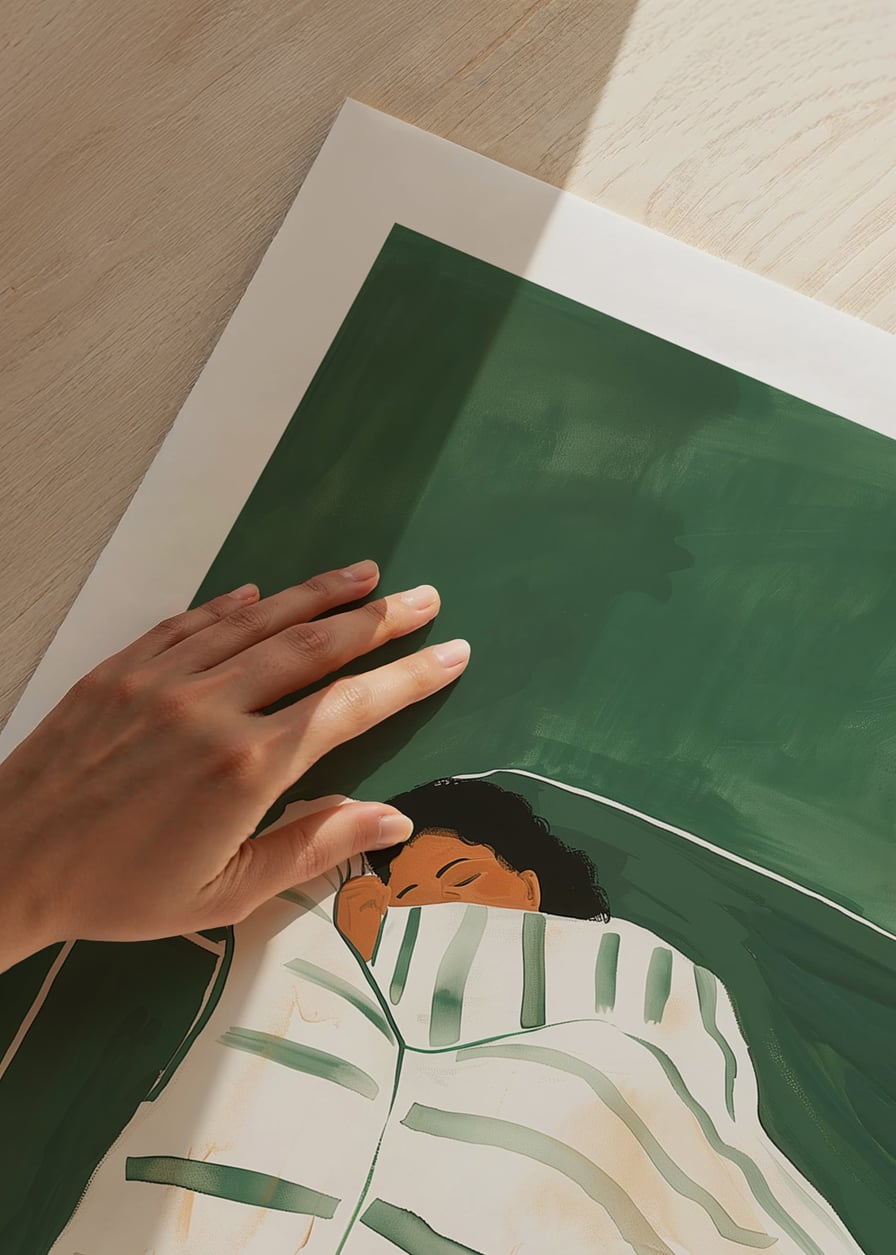 A poster depicting a person wrapped in a striped blanket, resting peacefully on a green sofa-12