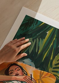 A poster depicting a woman in total relaxation, resting in a golden armchair-9