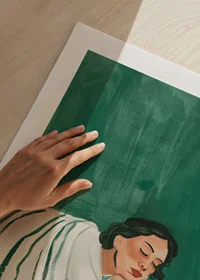 A poster depicting a woman in deep rest, wrapped in a striped blanket-9