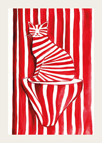 A tabby cat blends with red and white stripes in a playful pattern-3