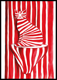A tabby cat blends with red and white stripes in a playful pattern-6