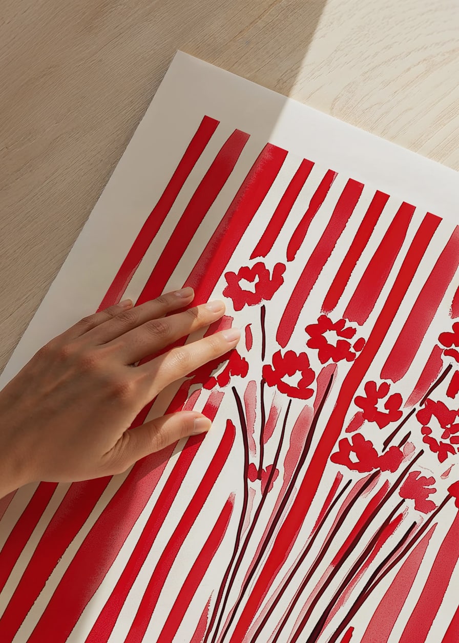 Flowers in vase captured against dynamic red-and-white striped background-12
