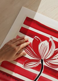 A stylish lotus flower floats against dynamic red stripes-9