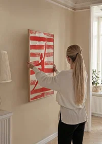 The red silhouette in motion creates energy and dynamics against a striped background-8