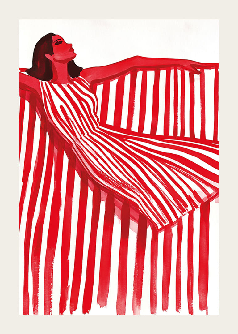 Een levendige vrouw in een rood-wit gestreepte jurk straalt vrolijke elegantie uit-12