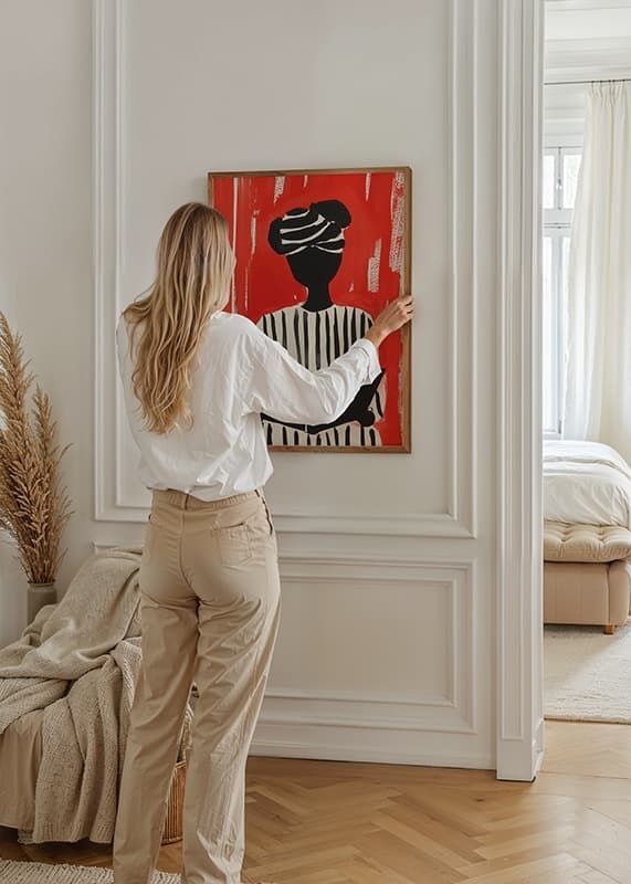 Zwart-wit silhouetmotief met boek, tegen een opvallende rode achtergrond-12