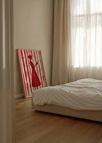 Red silhouette against striped background gives minimalist elegance-8