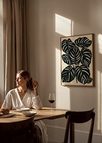 Dark monstera leaves create a bold and stylish botanical feel-2