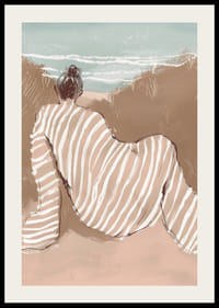 En drømmende silhuet stirrer ud over bølgerne i bløde, varme toner-2