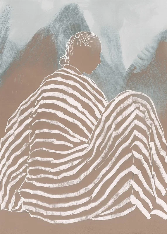 A relaxed figure wrapped in striped fabric against soft mountain tones-12