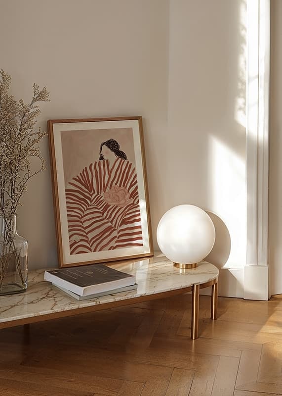 A stylish illustration of a woman nestled in stripes, with calm earth tones-12