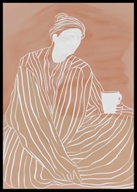 Relaxed elegance in earthy tones with a warm cup in hand-6