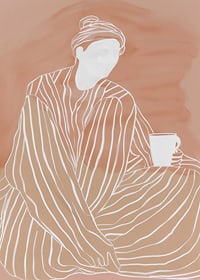 Relaxed elegance in earthy tones with a warm cup in hand-7