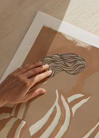 Two silhouettes in soft tones meet in a harmonious dance of lines and shapes.-9