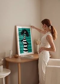Charming design and style meet in black and white stripes against a turquoise background-8