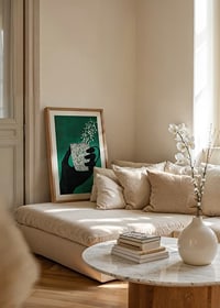 A silhouette hand holding a magic cup on a deep green background-8