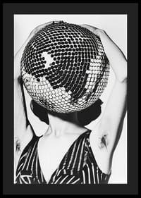 Contrasts capture the mystique of a disco ball face-4