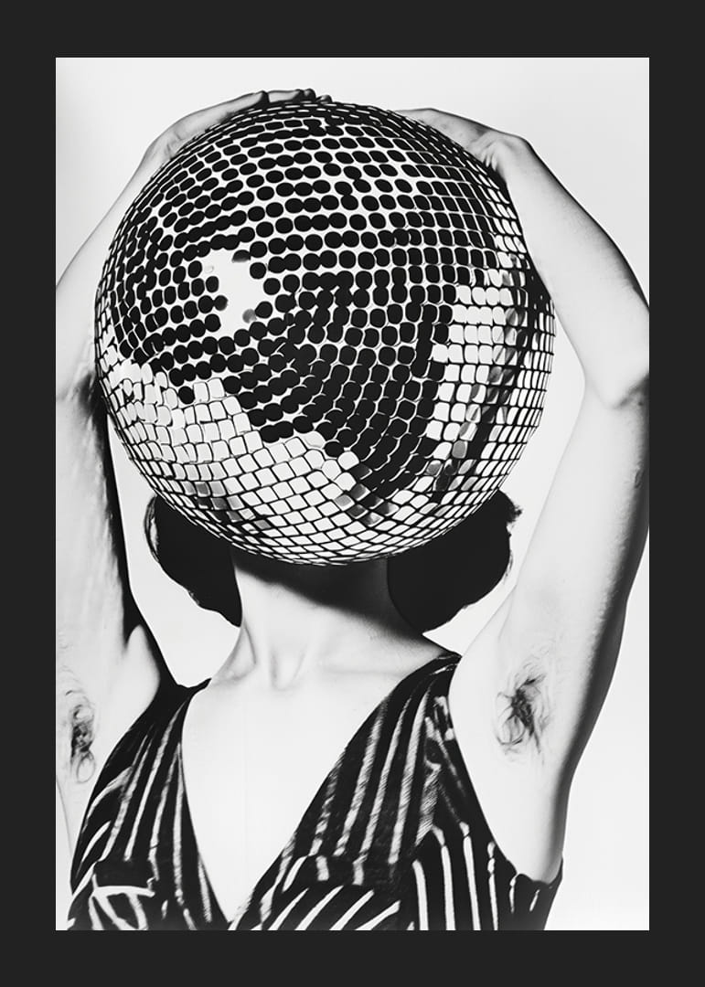 Contrasts capture the mystique of a disco ball face-12