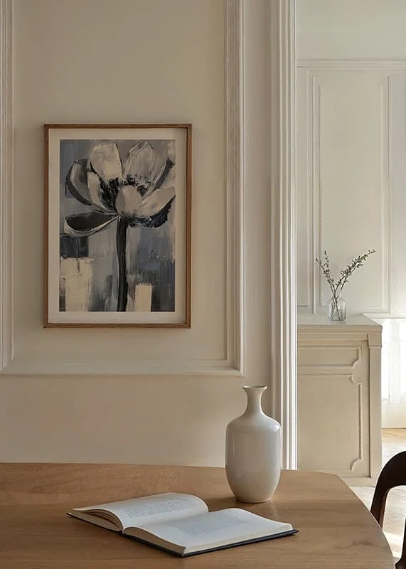 The flower floats in soothing blue and gray tones-12