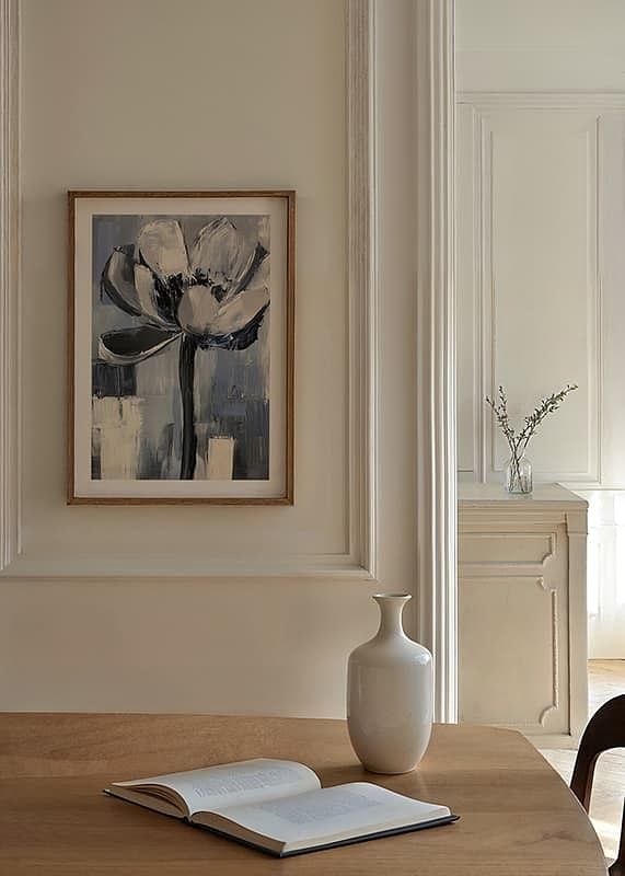 The flower floats in soothing blue and gray tones-12